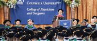 Commencement ceremony with a speaker addressing the graduates.